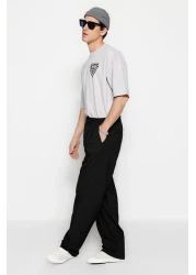  Collection بنطلون أسود واسع الساق من القماش الفضفاض TMNSS23PL00039