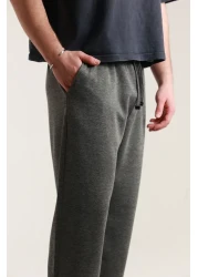 TKT بنطال بيكيه فضفاض للرجال