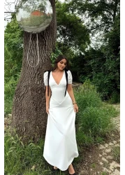 FMN Moda تنورة بأكمام واسعة ورقبة على شكل حرف V - مع تفاصيل فيونكة وخياطة