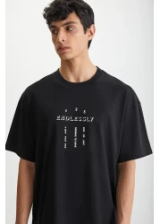 GRIMELANGE تي شيرت RAMADANP017 للرجال مصنوع من القطن بنسبة 100% برقبة دائرية ومطبوع باللون الأسود