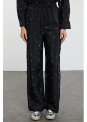  Modest بدلة صيفية من القماش المنفوش باللون الأسود اللامع مع تفاصيل حجرية قابلة للتعديل من الأسفل إلى الأعلى TCTAW25US00106