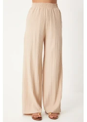 Happiness İstanbul طقم بالازو محبوك بلون كريمي للنساء - سترة بحزام BY00055