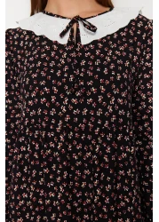  Modest فستان فيسكوز منقوش باللون الأسود مع تفاصيل طية صدر السترة TCTSS21EL3655