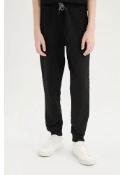 Defacto طقم للأولاد مكون من 3 قطع - سويت شيرت بغطاء للرأس، بدون أكمام ومطبوع، تي شيرت بأكمام قصيرة، ملابس بأرجل مرنة