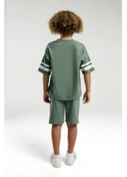 U.S. Polo Assn. بدلة برمودا كاكي للأولاد من US Polo Assn