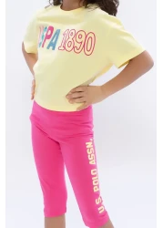 U.S. Polo Assn. طقم لباس ضيق برقبة دائرية للفتيات باللون الأصفر الفاتح