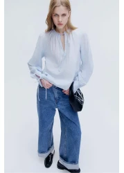 H&M بلوزة قطنية بتفاصيل ربطة عنق