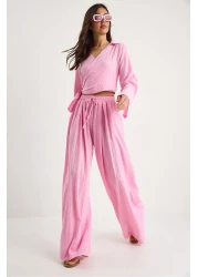 Bianco Lucci بلوزة نسائية برباط على شكل حرف V وجيب وخصر مطاطي وبنطلون فضفاض 60283324