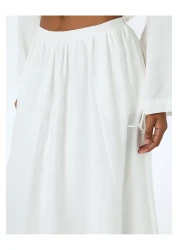 Koton تنورة طويلة واسعة بخصر عالٍ مع جيوب مبطنة