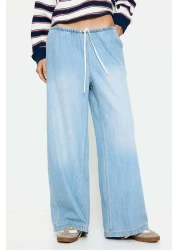 H&M بنطلون جينز برباط