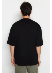  Collection تي شيرت قطني أسود كبير الحجم مع تطريز ديناصور - TMNSS23TS00243