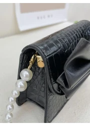 حقيبة مربعة بنقش تمساح مزخرف بعقدة الفراشة بنات