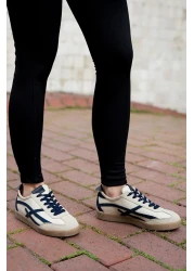 Marjin حذاء رياضي نسائي برباط من Alvena باللون الأزرق الداكن