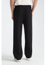 Redline بنطلون رجالي من الكتان المريح - مقاس فضفاض من Saga