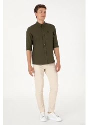 U.S. Polo Assn. قميص أساسي بأكمام طويلة كاكي داكن للرجال 50306338 -VR111