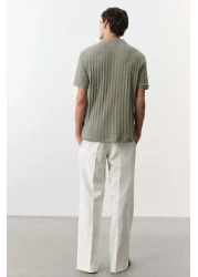 H&M قميص بولو جيرسي منسوج بقصّة Slim Fit