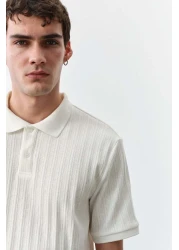 H&M قميص بولو جيرسي منسوج بقصّة Slim Fit