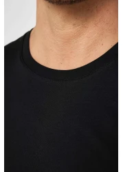 Tudors تي شيرت أسود ذو قصة ضيقة للجنسين مصنوع من القطن بنسبة 100% ورقبة دائرية