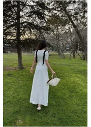 Afiş Butik أبيض عميق الخامس الرقبة قبالة الكتف القوس التفاصيل اصطف فستان طويل