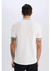 Defacto تي شيرت بياقة بولو وأكمام قصيرة بقصة عادية E2251ax25sm