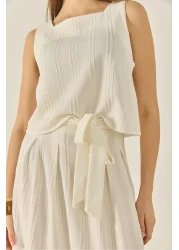 Bianco Lucci بلوزة نسائية بحزام سميك مع تنورة طويلة فضفاضة بدلة صيفية مزخرفة من الأسفل إلى الأعلى 9329 60281045