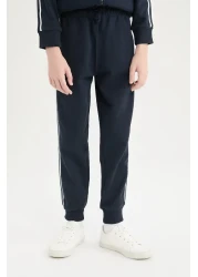 Defacto طقم مكون من قطعتين للأولاد - سترة بومبر بسحاب وياقة جامعية وسروال رياضي مطاطي D9854a825sp