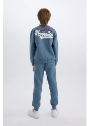 Defacto طقم سويت شيرت وبنطال رياضي للأولاد مكون من قطعتين - رقبة دائرية، طباعة، خصر مطاطي D3564a824wn