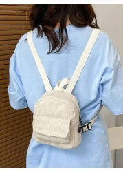 حقيبة ظهر صغيرة بلون أحادي عصرية وعتيقة مناسبة للتسوق واللعب والسفر مناسبة للذكور والإناث. زيبر وحزام كتف قاب