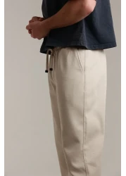 TKT بنطال بيكيه فضفاض للرجال