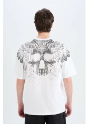 Defacto تي شيرت قطن 100% كبير الحجم بقصة واسعة وياقة دائرية وطباعة خلفية وأكمام قصيرة D5600ax25sp