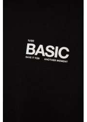  Collection تي شيرت قطني أسود كبير الحجم مطبوع عليه نص - TMNSS23TS00263