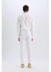 Defacto بنطلون من القماش الأبيض الصيفي ذو القطع العادية بنسبة 100% من الكتان C1826ax25sm