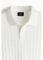 H&M قميص بولو جيرسي منسوج بقصّة Slim Fit