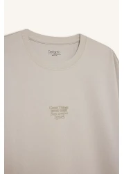 Defacto تي شيرت Boxy Fit برقبة دائرية وأكمام قصيرة من القماش الثقيل D5517AX25SP