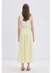 KADRİYE BAŞTÜRK تنورة نورا مطوي أصفر ليموني