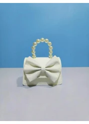 حقيبة يد لأطفال عصرية باللؤلؤ الجديدة، هدية للأطفال في المهرجان، جلد بو بشكل عقدة عقدة الفراشة فاشن ميني حقيب