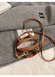 حقيبة يد صغيرة جديدة بشكل قوقعة. حقيبة صغيرة عملية وأنيقة للتعلق عبر الجسم. حقيبة مسائية متعددة الاستخدامات. م