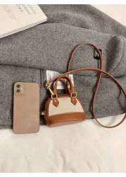 حقيبة يد صغيرة جديدة بشكل قوقعة. حقيبة صغيرة عملية وأنيقة للتعلق عبر الجسم. حقيبة مسائية متعددة الاستخدامات. م